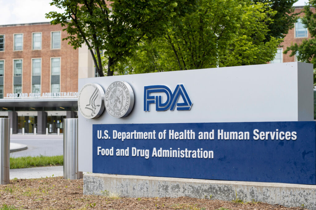 Sign in front of building that says "FDA U.S. Department of Health and Human Services Food and Drug Administration." 
Picture by Tada Images.