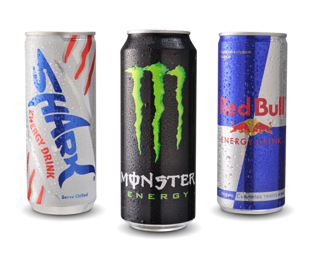 SOFIA, BULGARIA - MAY 28, 2014: Photo of Shark, Red Bull and Monster energy drink cans isolated on white background