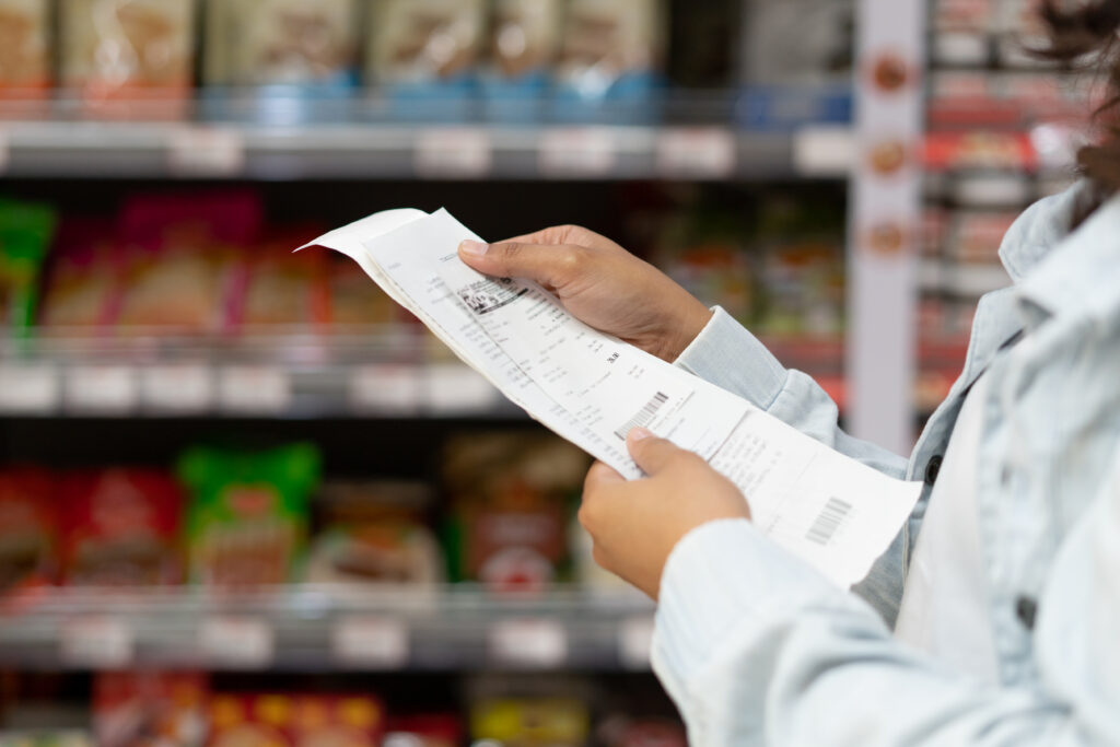 inflation effect, women customer checking product bills after shopping and price are rising
By Pormezz