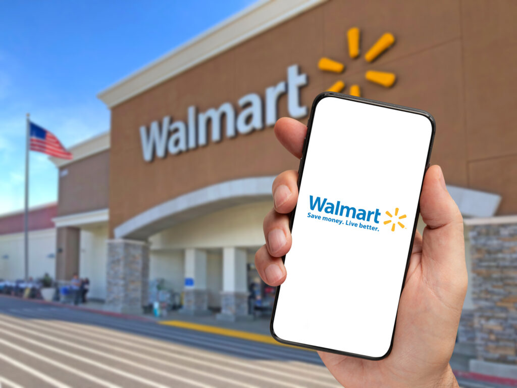 Los Angeles, California, USA - June 13, 2022 - Walmart retailer delivery application on smartphone holding by hand with blurry background.
By H. Ozmen